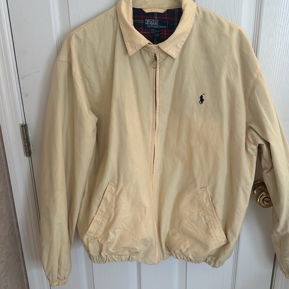 Polo yellow jacket with red plaid lining.  Warm jacket